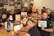 Thank-you cards, light pens, and Peacemaker Bibles for LAPD Officers
