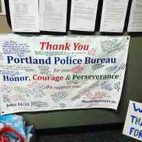 The banner for Portland Police, packed with signatures and Thank You notes.