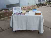 A table with books, Bibles and cards to be filled out with prayer requests at the USBP Station in Calexico.  This table was available for agents to visit on their own volition during a BBQ lunch hosted by Morale Boosters.