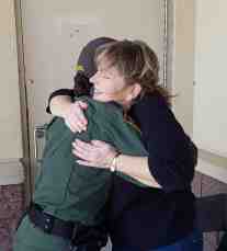 Diane Langan of Morale Boosters, hugs a female USBP Agent at the BBQ at the El Centro USBP Headquarters