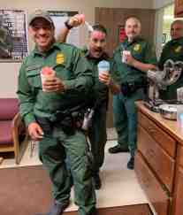 Agents enjoy a Snow-Cone at the Las Cruces morale boost to encourage the overworked agents during the Morale Boosters visit.