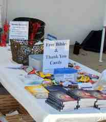A table containing Peacemaker Bibles, books, candy, and MANY hand-written Thank You notes made available for the Law Enforcement Officers to pick up if desired.